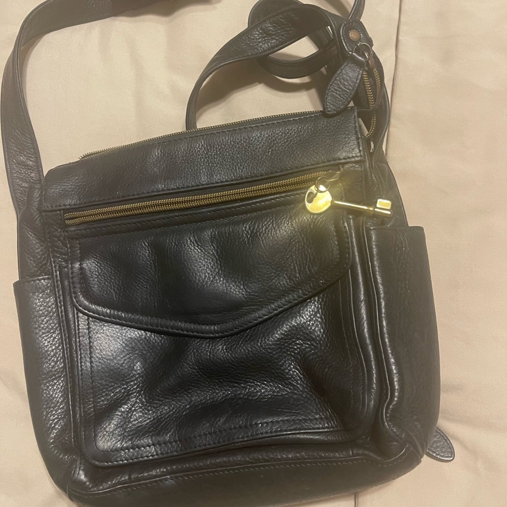 Woman’s Fossil Cross body purse